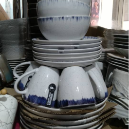 Elegant White Ceramic Dinnerware with Blue Marbled Design