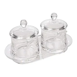 Jam jar with spoons